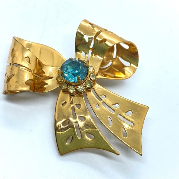 Vintage Goldtone Blue Rhinestone Bow Cut Out Brooch - Picture 1 of 7